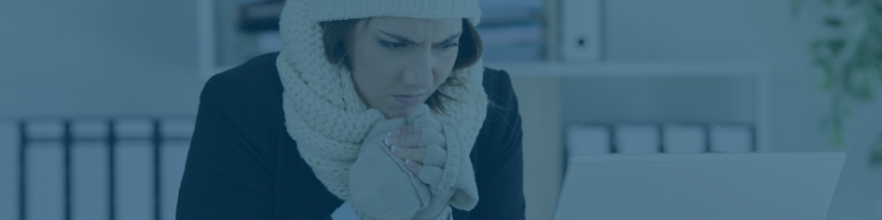 woman affected by cold workplace temperature